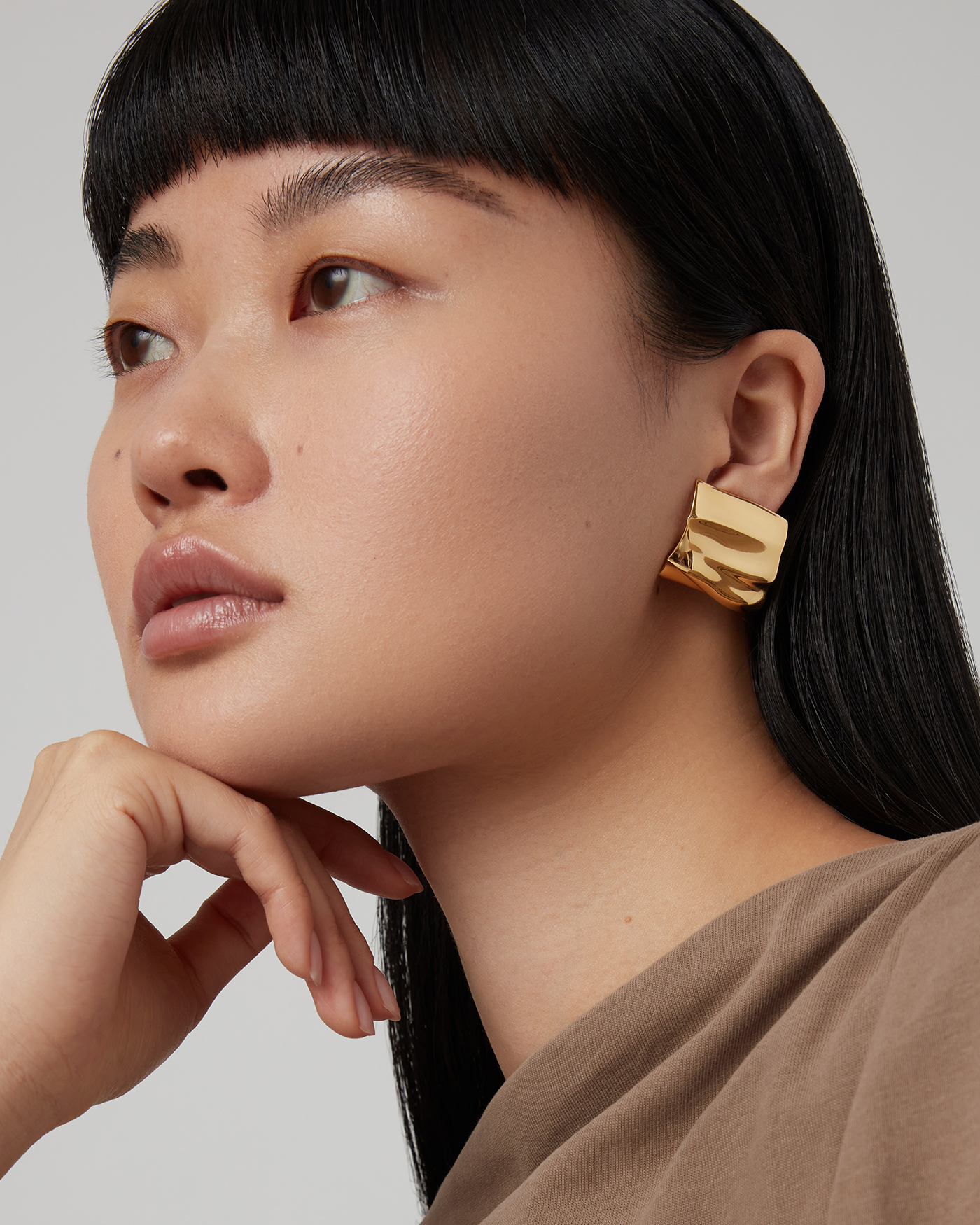 Sundra Clip On Earrings